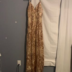 Gold prom dress Wired v-neckline. And padded cups. 100% polyester